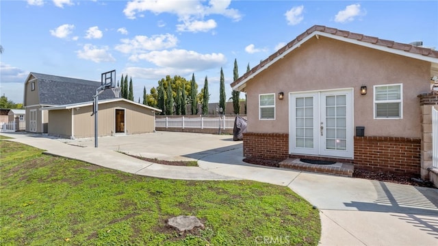11815 Briarrose Ln, Chino, CA 91710 - back of house featuring brick siding, french doors, and a patio area