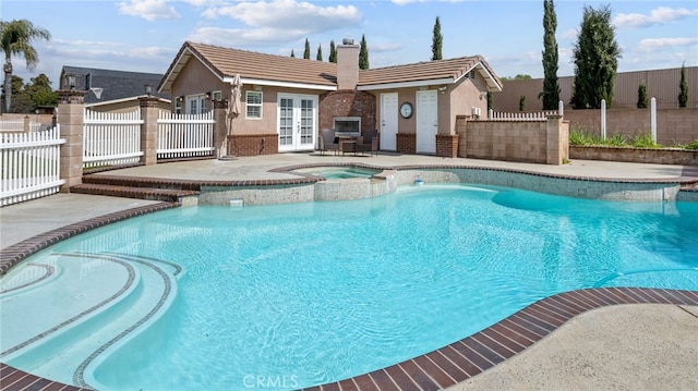11815 Briarrose Ln, Chino, CA 91710 - view of pool with french doors, a patio area, and a pool with connected hot tub