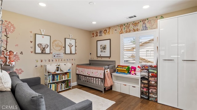 11815 Briarrose Ln, Chino, CA 91710 - bedroom with wood finished floors and recessed lighting