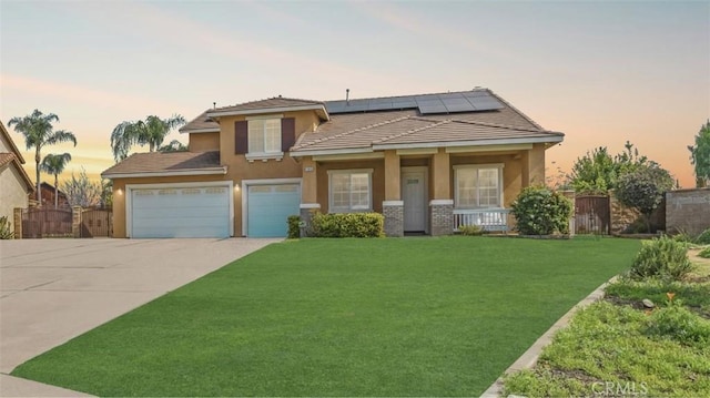 11815 Briarrose Ln, Chino, CA 91710 - view of front of property with stucco siding, driveway, solar panels, a porch, and a tile roof