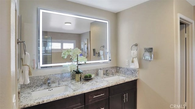 bathroom featuring double vanity