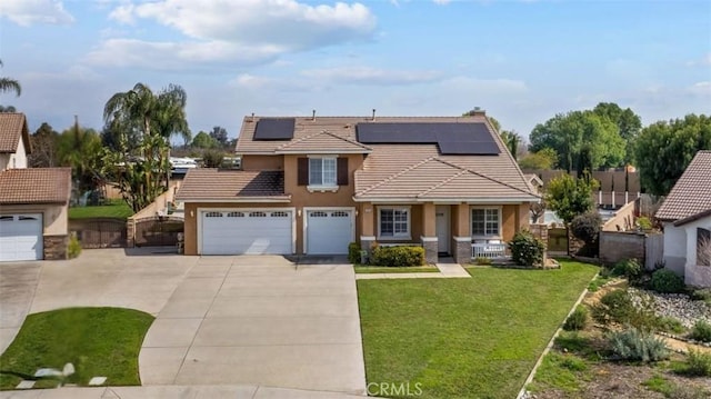 11815 Briarrose Ln, Chino, CA 91710 - traditional home featuring concrete driveway, a tile roof, stucco siding, a porch, and solar panels