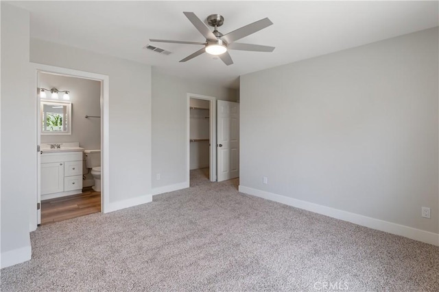 6018 William St, Riverside, CA 92504 - unfurnished bedroom featuring carpet, baseboards, a spacious closet, and a closet