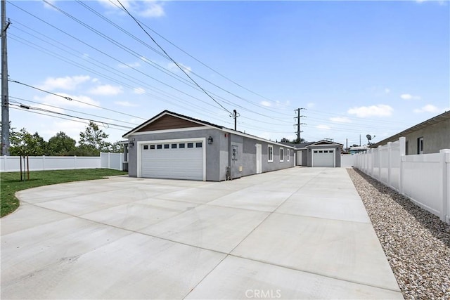 6018 William St, Riverside, CA 92504 - view of front of home with stucco siding and a garage