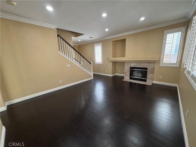 15986 Wilmington Rd, Chino Hills, CA 91709 - unfurnished living room featuring baseboards, dark wood-type flooring, crown molding, stairs, and recessed lighting