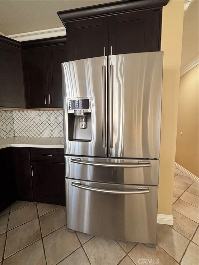 15986 Wilmington Rd, Chino Hills, CA 91709 - kitchen with stainless steel fridge with ice dispenser, light tile patterned floors, light countertops, tasteful backsplash, and baseboards