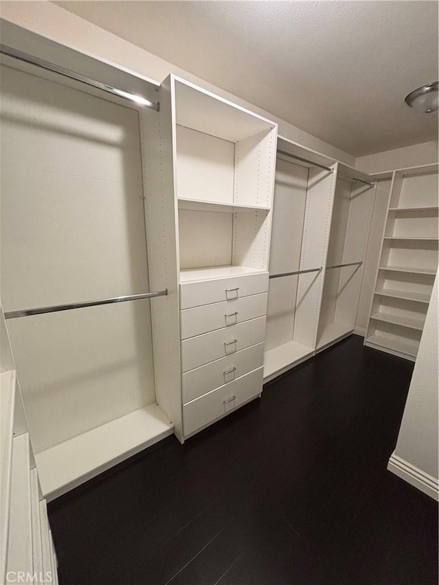 15986 Wilmington Rd, Chino Hills, CA 91709 - spacious closet with dark wood-style flooring