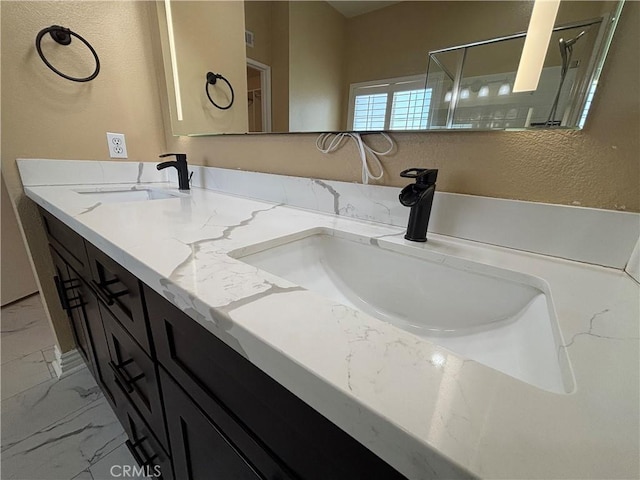 15986 Wilmington Rd, Chino Hills, CA 91709 - full bath with marble look tiles, double vanity, and a shower stall