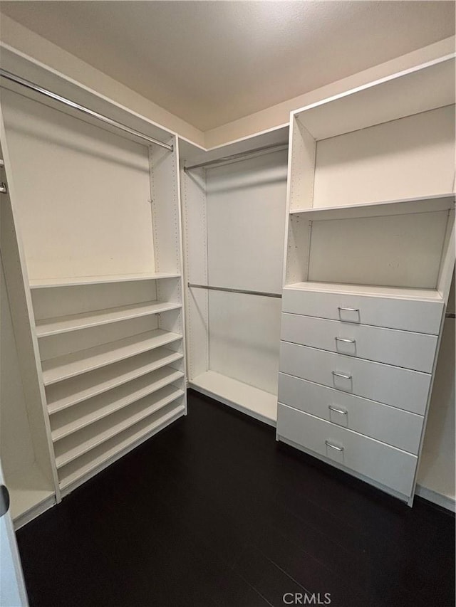 15986 Wilmington Rd, Chino Hills, CA 91709 - spacious closet with dark wood finished floors