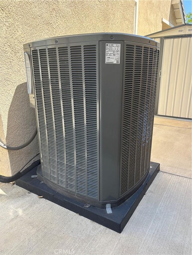 15986 Wilmington Rd, Chino Hills, CA 91709 - exterior view of stucco siding and central AC unit
