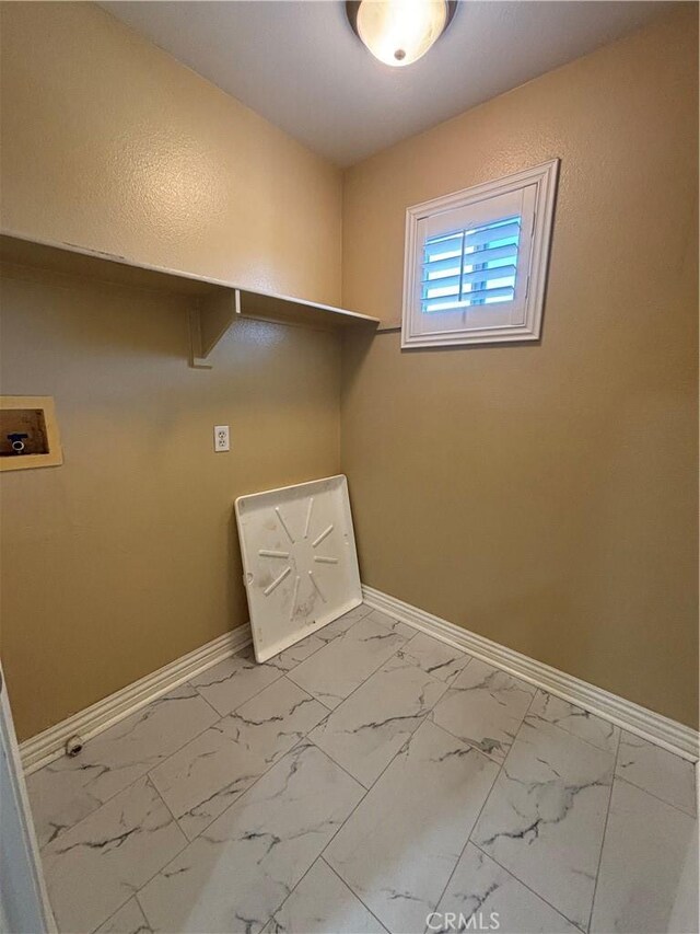 15986 Wilmington Rd, Chino Hills, CA 91709 - laundry room with baseboards, hookup for a washing machine, and marble finish floors