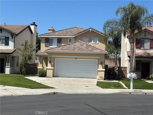 15986 Wilmington Rd, Chino Hills, CA 91709 - traditional home with concrete driveway, a garage, stucco siding, and a tiled roof