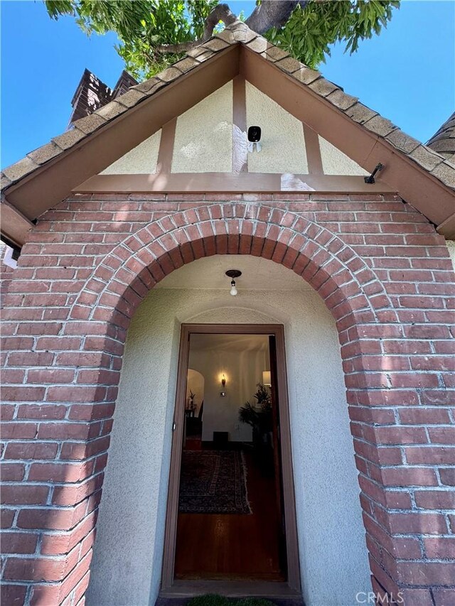 2415 N French St, Santa Ana, CA 92706 - doorway to property with brick siding and stucco siding