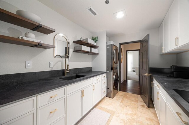 3044 Casmeg Way, El Cajon, CA 92019 - kitchen featuring open shelves, freestanding refrigerator, white cabinetry, range hood, and dark stone counters