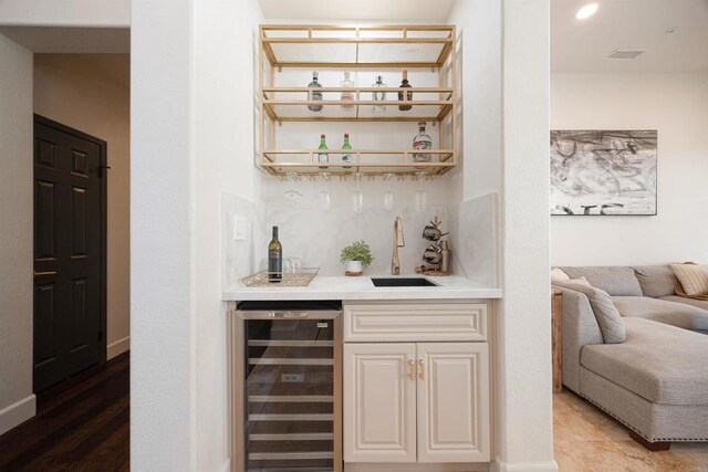 3044 Casmeg Way, El Cajon, CA 92019 - indoor wet bar with wine cooler and light wood-style floors