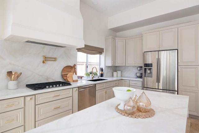 3044 Casmeg Way, El Cajon, CA 92019 - kitchen with appliances with stainless steel finishes, premium range hood, tasteful backsplash, and cream cabinetry