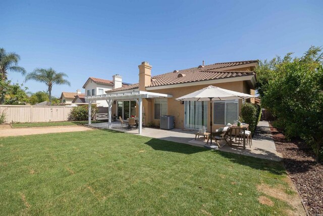 3044 Casmeg Way, El Cajon, CA 92019 - rear view of house with a pergola, a patio, a tiled roof, stucco siding, and a chimney