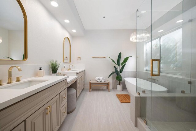 3044 Casmeg Way, El Cajon, CA 92019 - full bath featuring two vanities, a shower stall, recessed lighting, and a soaking tub