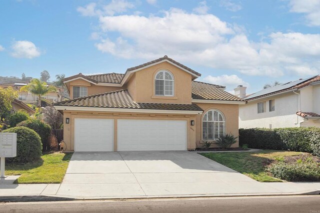 3044 Casmeg Way, El Cajon, CA 92019 - view of front facade featuring concrete driveway, stucco siding, a tile roof, and an attached garage