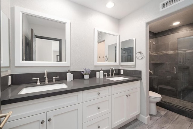 3044 Casmeg Way, El Cajon, CA 92019 - full bathroom featuring double vanity, a stall shower, and recessed lighting