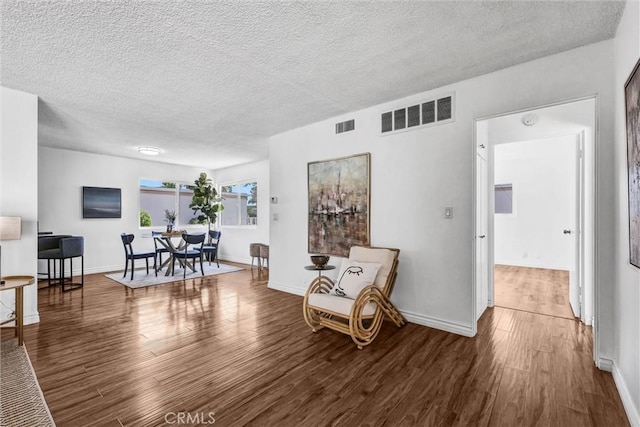 777 E Valley Blvd Unit 77, Alhambra, CA 91801 - sitting room featuring wood finished floors, a textured ceiling, and baseboards