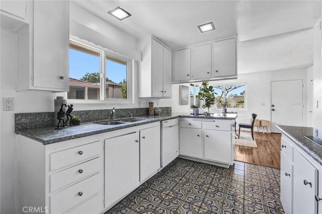777 E Valley Blvd Unit 77, Alhambra, CA 91801 - kitchen with a sink, healthy amount of natural light, and white cabinetry