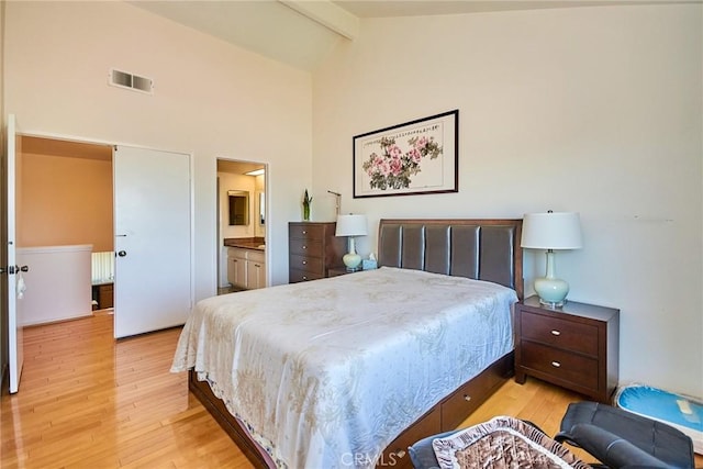 1144 Walnut Grove Ave Unit C, Rosemead, CA 91770 - bedroom featuring beamed ceiling, light wood-type flooring, connected bathroom, and high vaulted ceiling