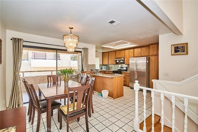 1144 Walnut Grove Ave Unit C, Rosemead, CA 91770 - dining space featuring a chandelier