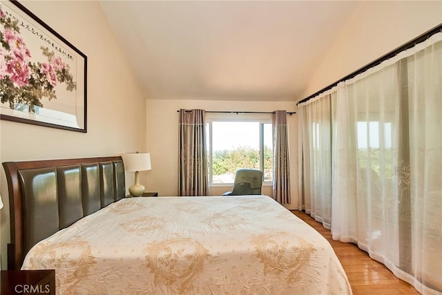 1144 Walnut Grove Ave Unit C, Rosemead, CA 91770 - bedroom with lofted ceiling and light wood-style flooring