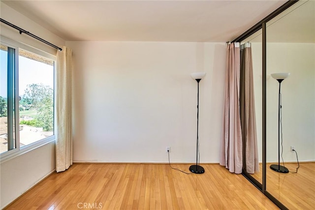 1144 Walnut Grove Ave Unit C, Rosemead, CA 91770 - spare room with plenty of natural light, light wood-style flooring, and baseboards