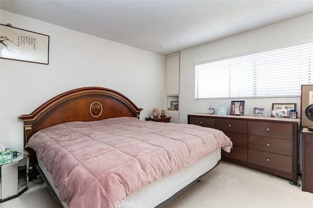 13100 Gilbert St Unit 28, Garden Grove, CA 92844 - bedroom with light carpet and a textured ceiling