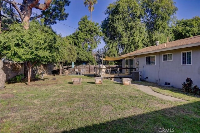 view of yard featuring central AC unit