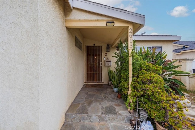 2613 E 221st St, Carson, CA 90810 - entrance to property featuring stucco siding