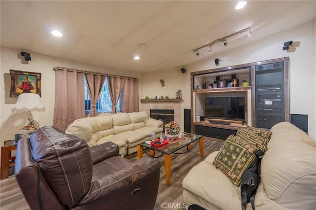 2613 E 221st St, Carson, CA 90810 - living room with wood finished floors, recessed lighting, and a glass covered fireplace