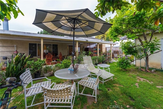 2613 E 221st St, Carson, CA 90810 - view of green lawn with outdoor dining space and a patio area
