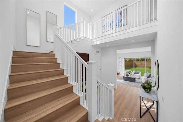 270 Maricopa, Irvine, CA 92618 - staircase with wood finished floors, a towering ceiling, and recessed lighting