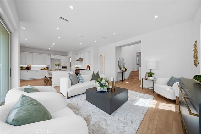 270 Maricopa, Irvine, CA 92618 - living room featuring light wood-style flooring and recessed lighting