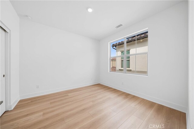 270 Maricopa, Irvine, CA 92618 - unfurnished bedroom featuring light wood-type flooring, baseboards, and a closet