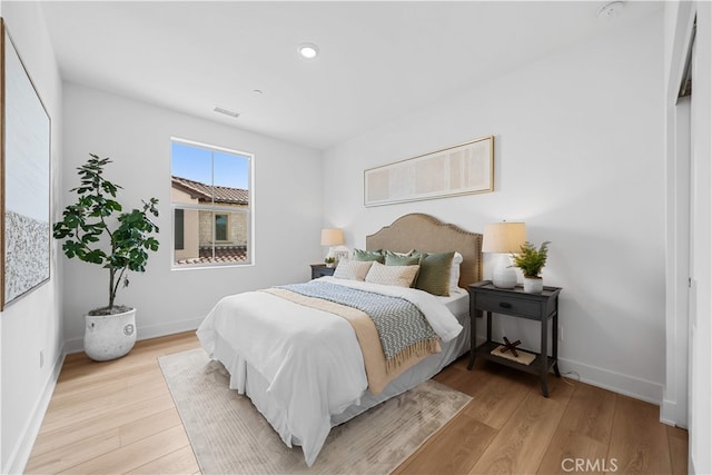270 Maricopa, Irvine, CA 92618 - bedroom with light wood-style flooring, baseboards, and recessed lighting