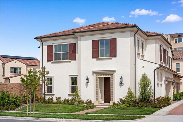 270 Maricopa, Irvine, CA 92618 - view of front of house with stucco siding, a tiled roof, and a front yard