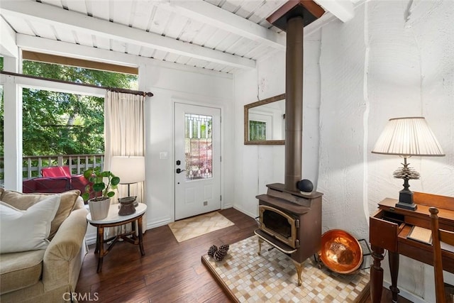 1359 Berwick Dr, Cambria, CA 93428 - entrance foyer with a wood stove, beam ceiling, and wood-type flooring
