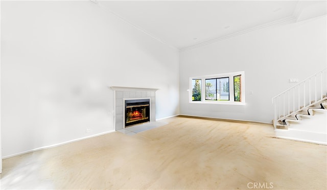 7948 Glenties Way, Sunland, CA 91040 - unfurnished living room featuring ornamental molding, a fireplace, stairs, and a high ceiling