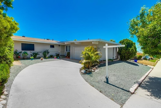 5019 Havenwood Ave, San Diego, CA 92120 - single story home featuring a garage, stucco siding, and concrete driveway