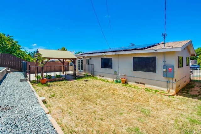 5019 Havenwood Ave, San Diego, CA 92120 - back of property with crawl space, a gazebo, solar panels, and a patio area