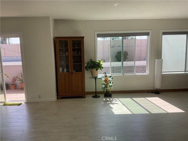6301 Coldwater Canyon Ave Unit 13, North Hollywood, CA 91606 - interior space featuring plenty of natural light, light wood-style floors, and baseboards