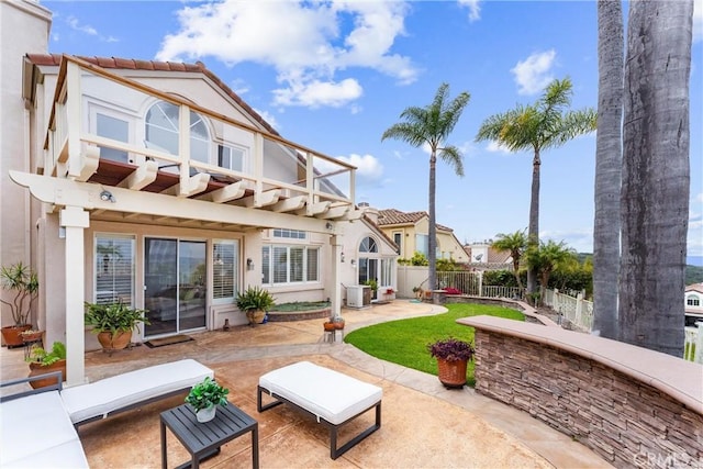 64 Camino, San Jose, San Clemente, CA 92672 - rear view of property featuring stucco siding, a patio area, a fenced backyard, and a tile roof
