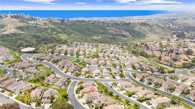 64 Camino, San Jose, San Clemente, CA 92672 - aerial overview of property's location with nearby suburban area and a mountainous background
