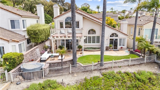 64 Camino, San Jose, San Clemente, CA 92672 - rear view of house with a fenced backyard, a balcony, a patio, and stucco siding