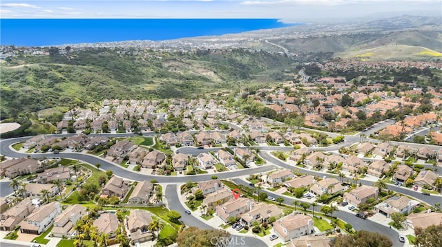64 Camino, San Jose, San Clemente, CA 92672 - aerial overview of property's location featuring nearby suburban area and a mountainous background