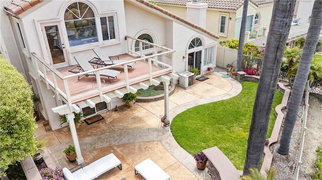 64 Camino, San Jose, San Clemente, CA 92672 - rear view of house featuring a tiled roof, stucco siding, fence, and a patio area